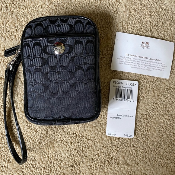 Coach Handbags - Coach Signature C Black Multifunctional Pouch